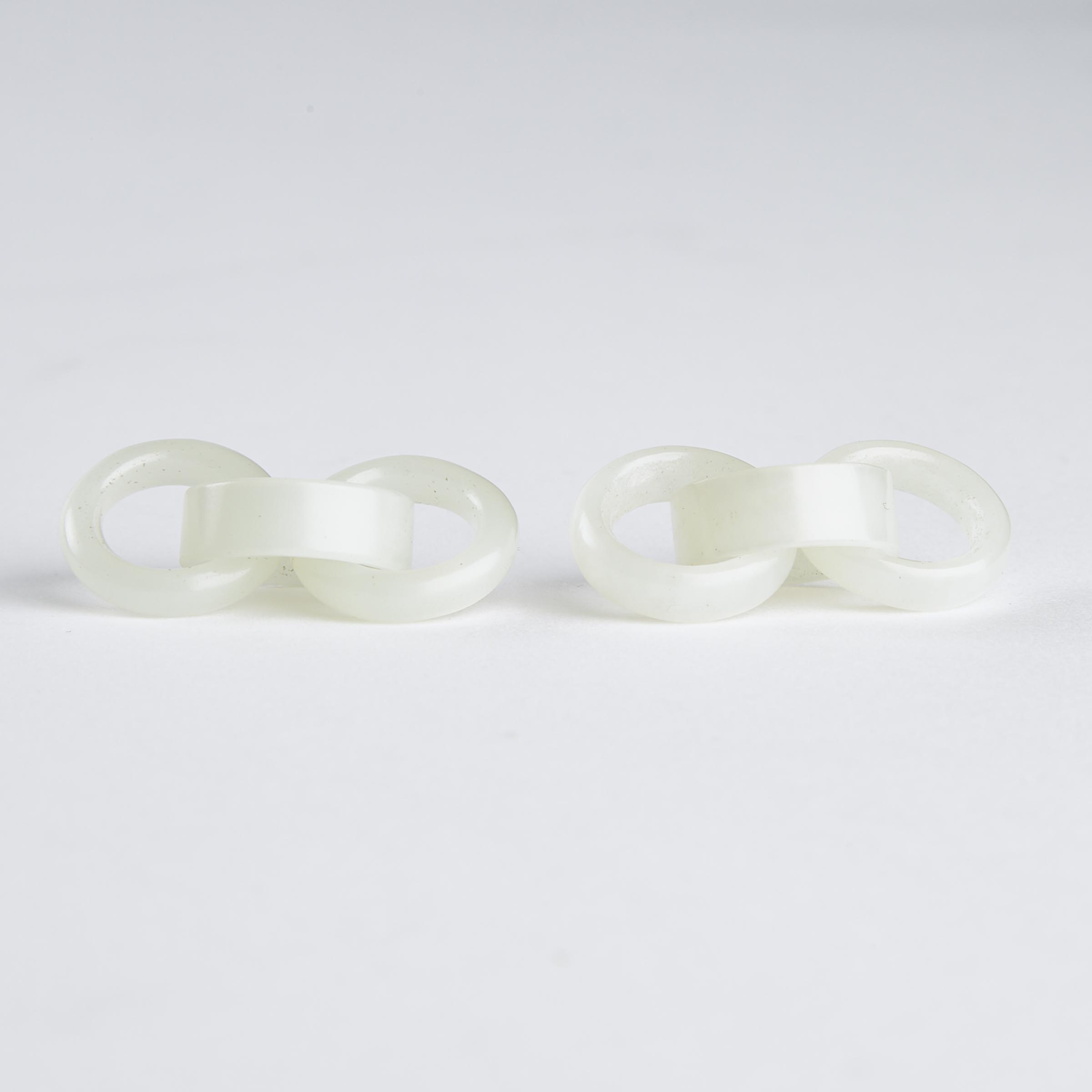 A Pair of White Jade 'Triple-Hoop'