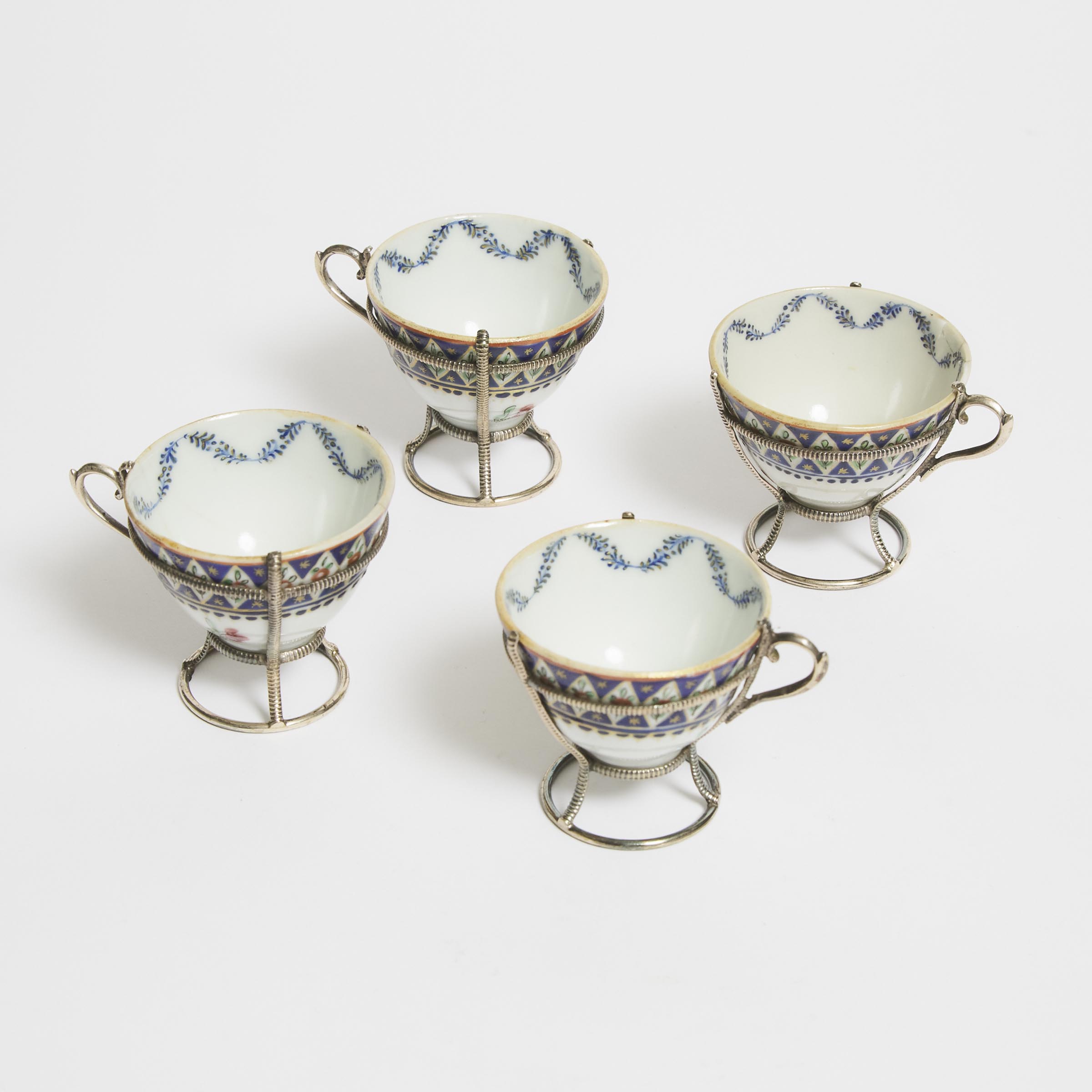 A Set of Four Silver-Mounted Chinese