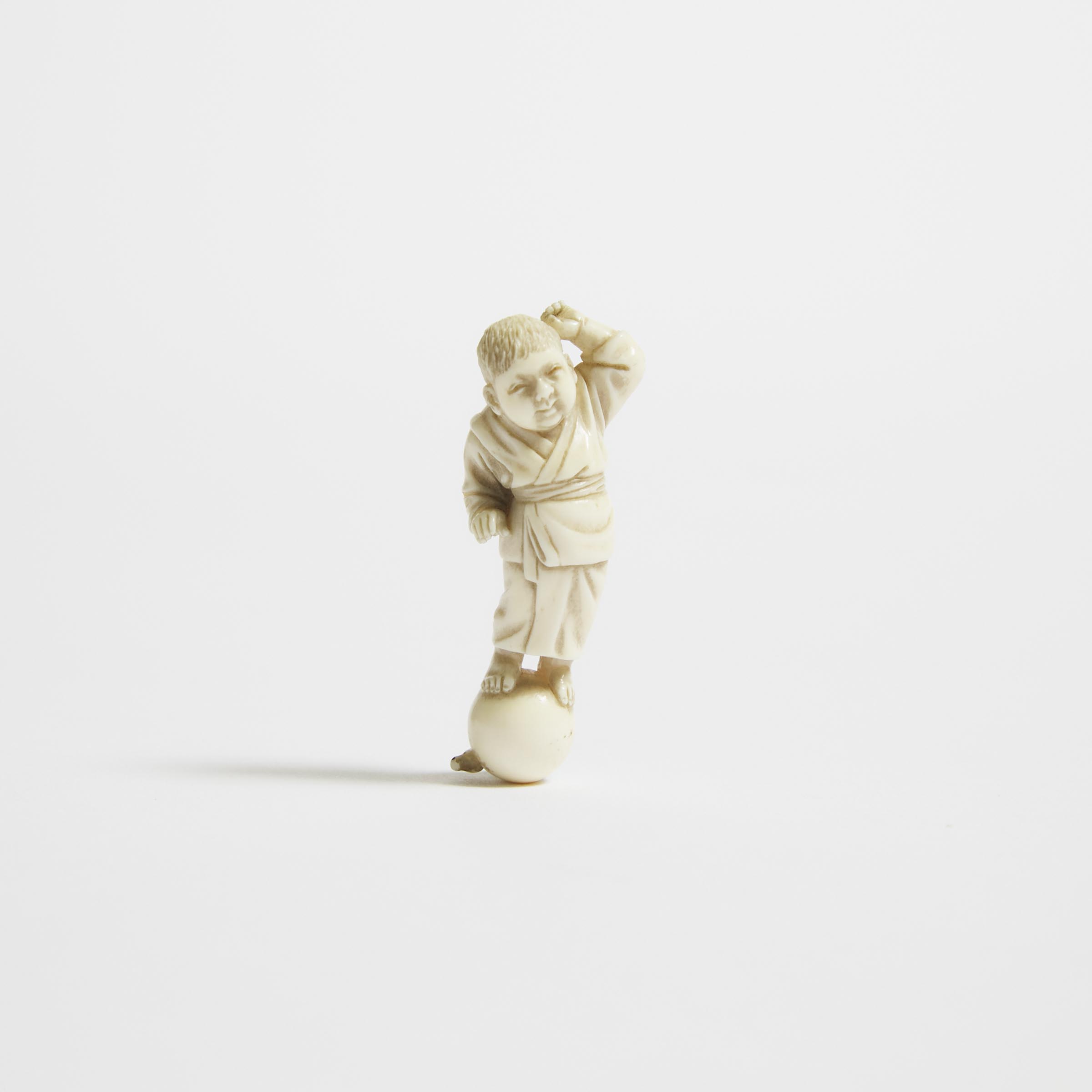 A Small Ivory Netsuke of a Child  3aa77f