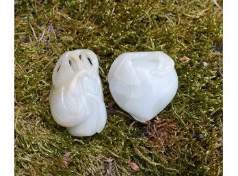 Two small Chinese jade fruit carvings.