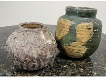 Two ceramic vessels made by Albert Jacobsen,