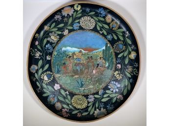 A large decorative painted wooden plate,