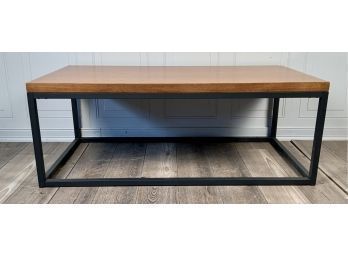 Coffee table with wood veneered top,