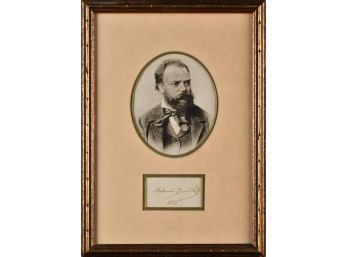 A framed autograph with photo of