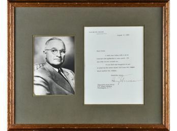 A framed Harry Truman ink signed,
