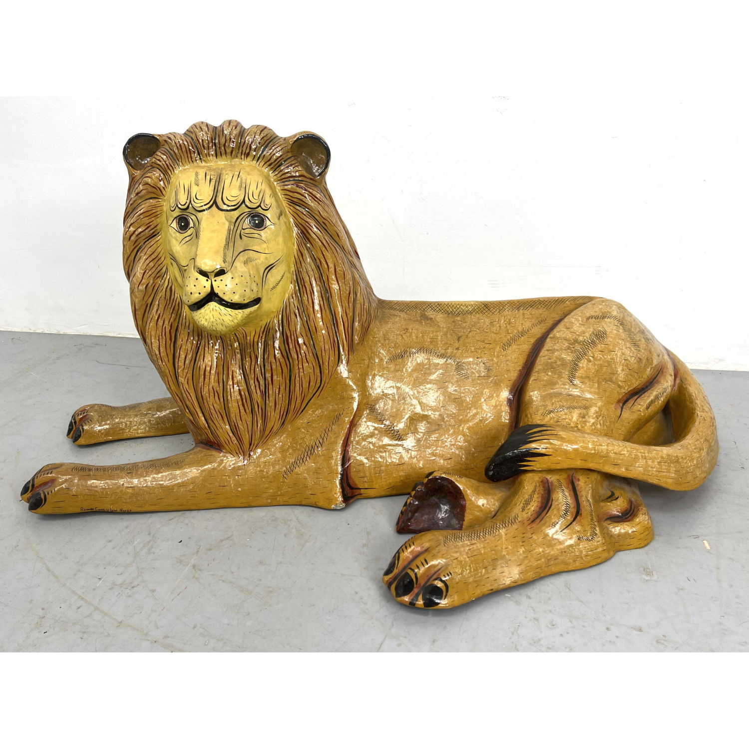 Papier-mache Lion sculpture signed.
