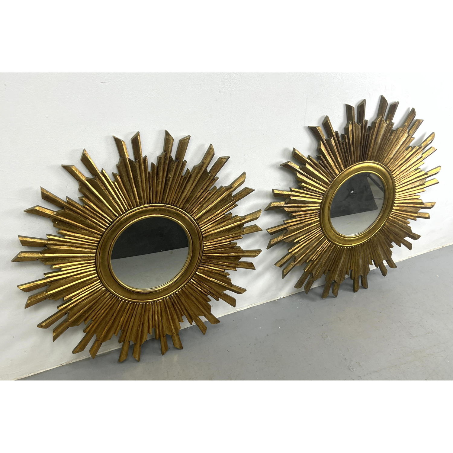 Pair Gold Star Sunburst Wall Mirrors.