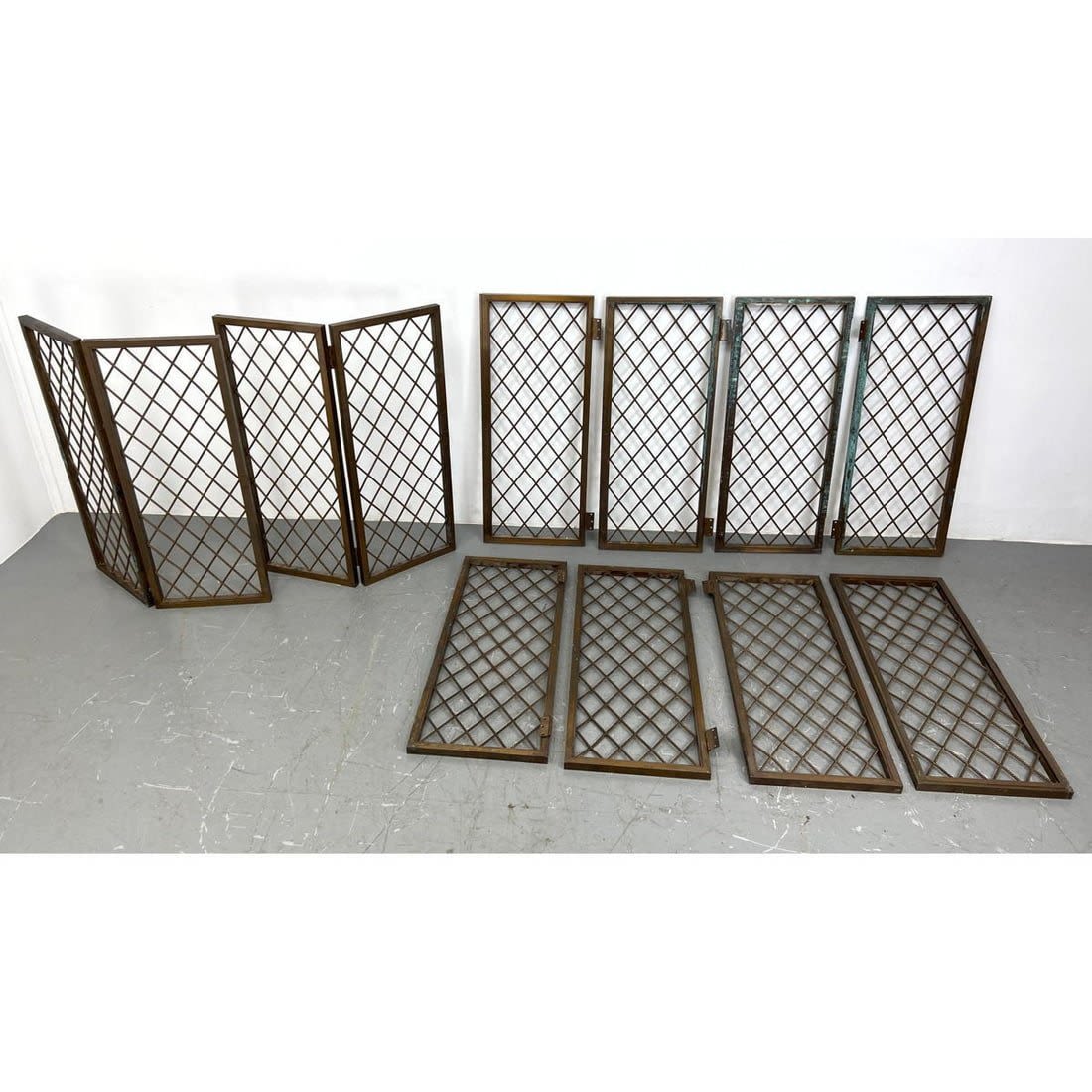 Collection of 12 Bronze Frame Grate