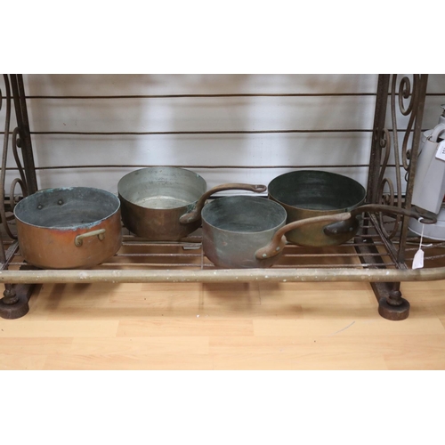 Four antique French copper pans,
