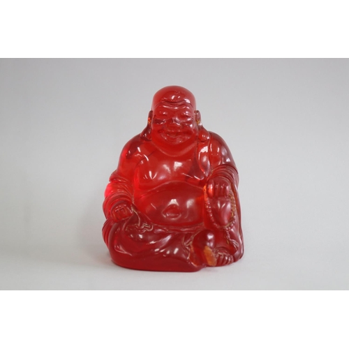 Chinese red resin seated Buddha 3ad8c4