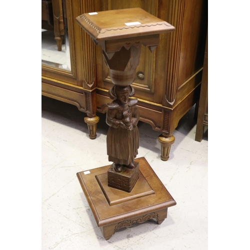 French Brittany figural jardiniere stand,