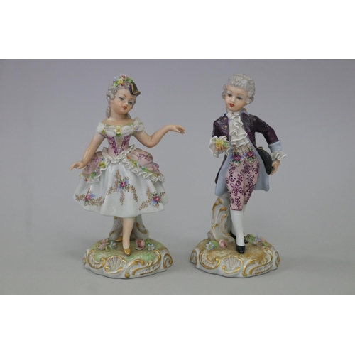 Pair of Naples Porcelain figures,