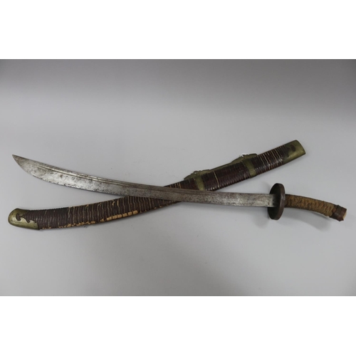 South East Asian sword and sheath,