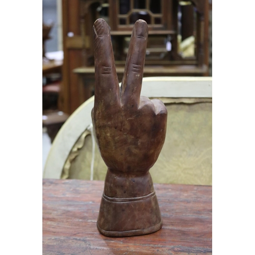Carved wood sculpture of "Peace",