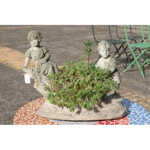 Figural pot plant, boy and girl