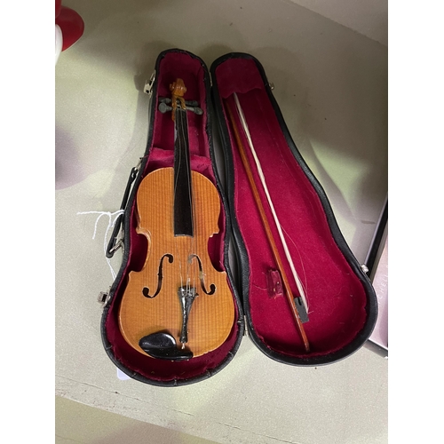 Cased miniature violin, approx