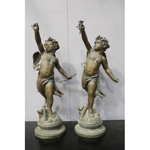 Pair of cast metal figures of putto,