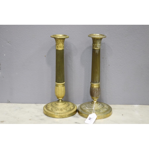 Pair of candlesticks, each approx 27cm