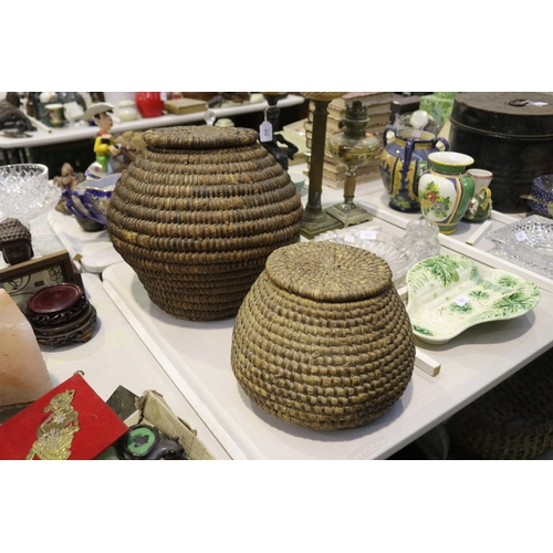 Two lidded woven baskets, approx