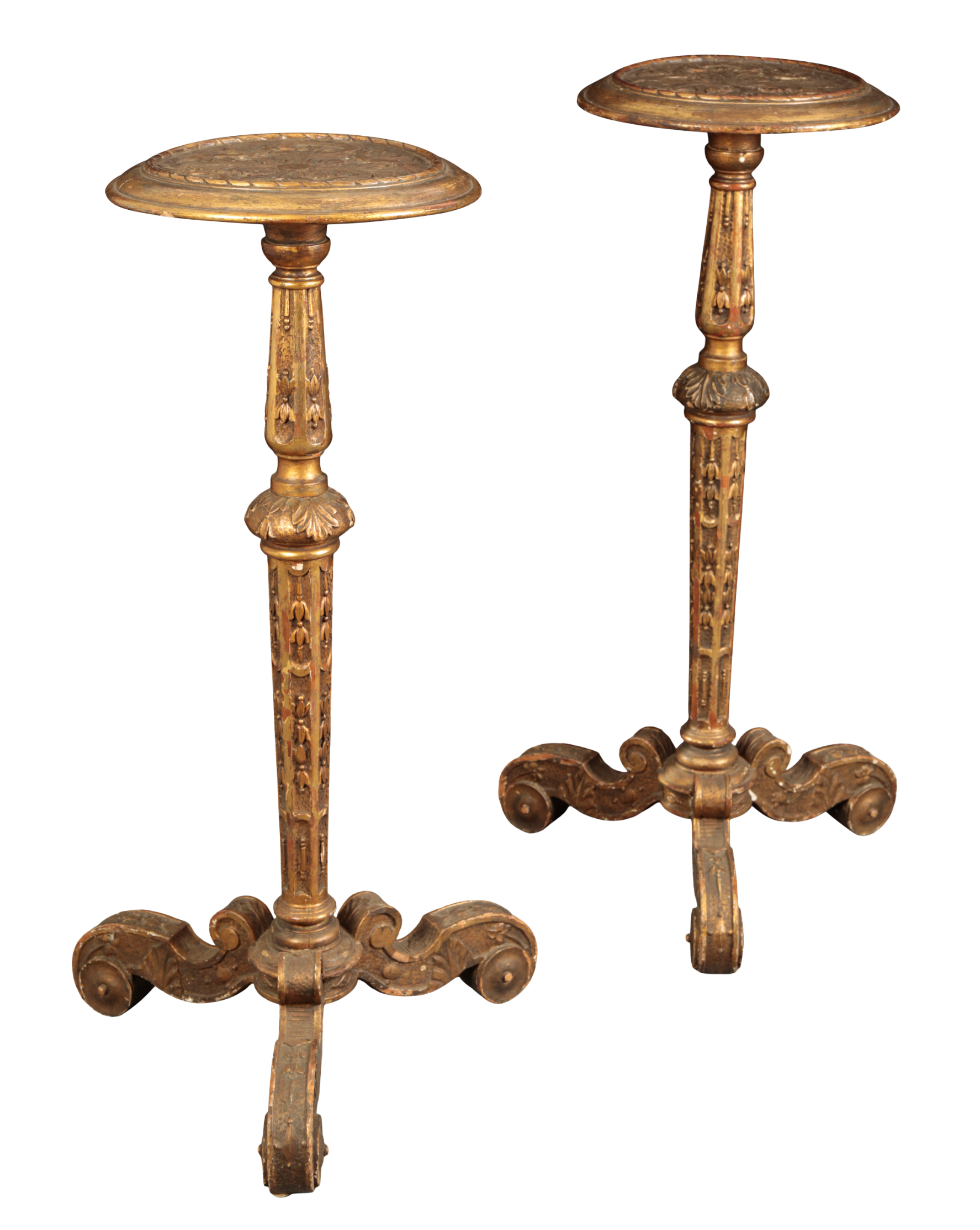 A PAIR OF CARVED AND GILTWOOD TORCHERE