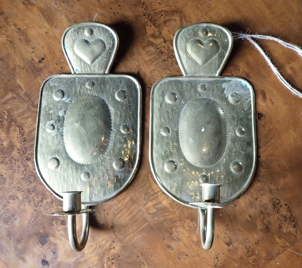 A PAIR OF SWEDISH EMBOSSED BRASS