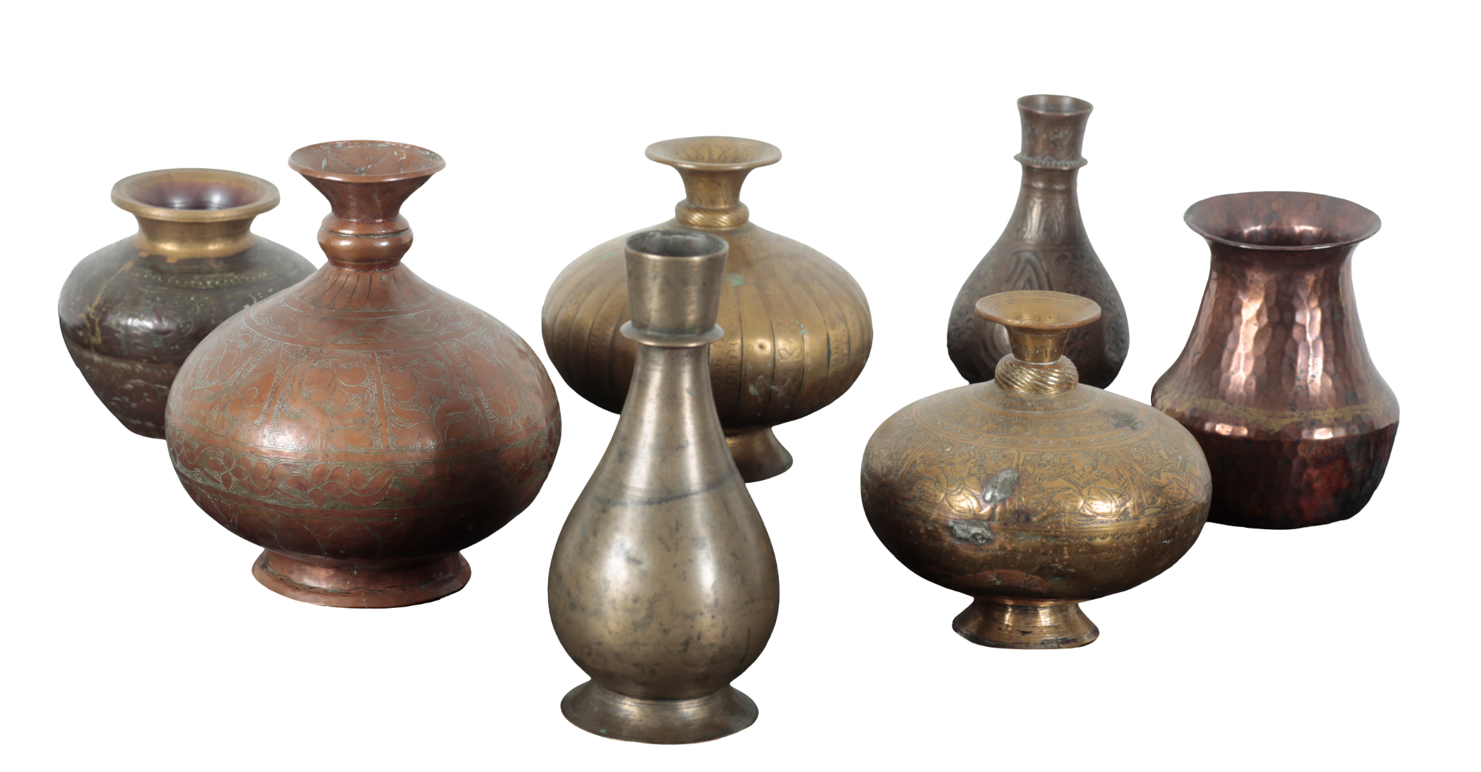 A GROUP OF SEVEN EASTERN BRASS AND COPPER