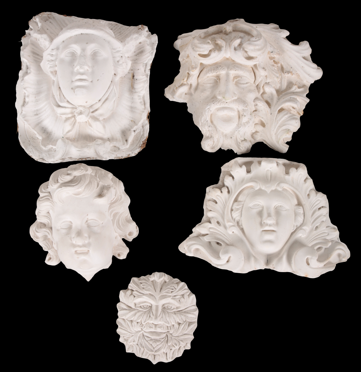 A GROUP OF FIVE PLASTER MOULDED