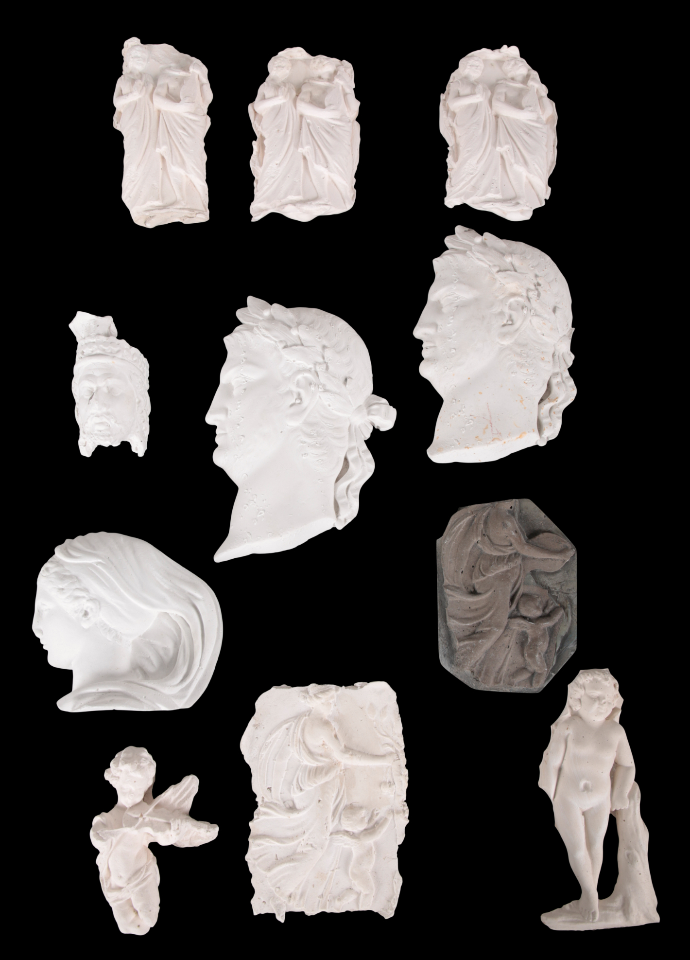 A COLLECTION OF ELEVEN PLASTER