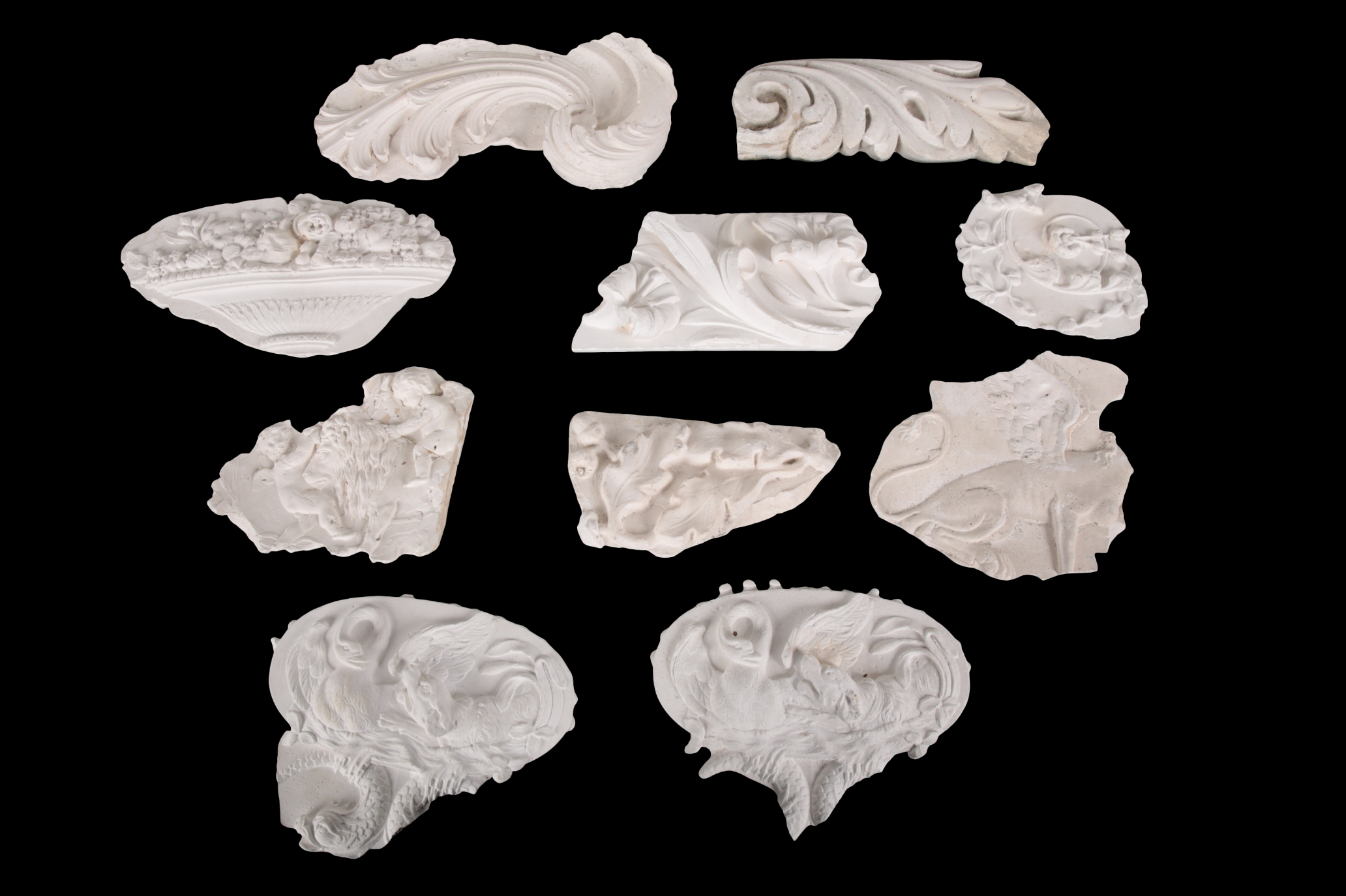 A GROUP OF TEN FRAGMENTARY PLASTER