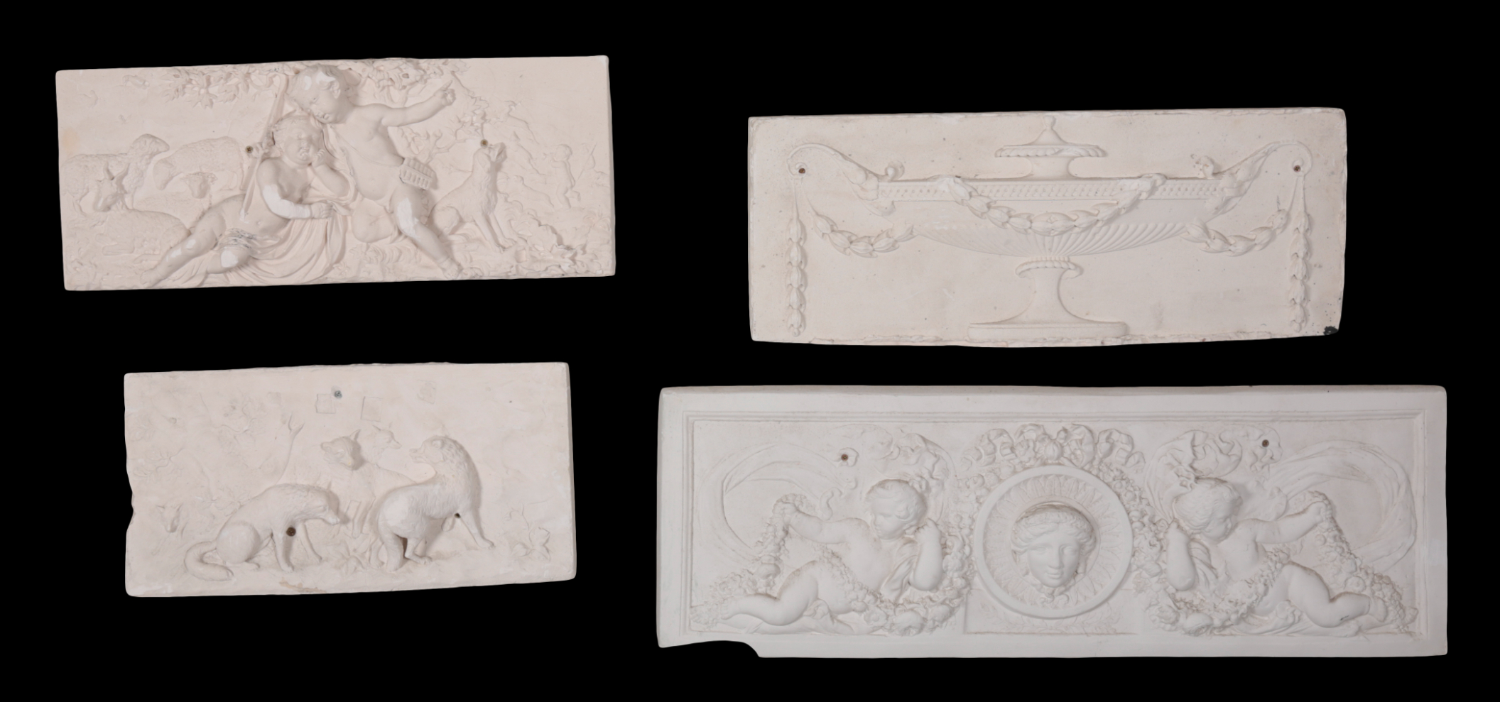 A GROUP OF FOUR PLASTER MOULDED 3ae065