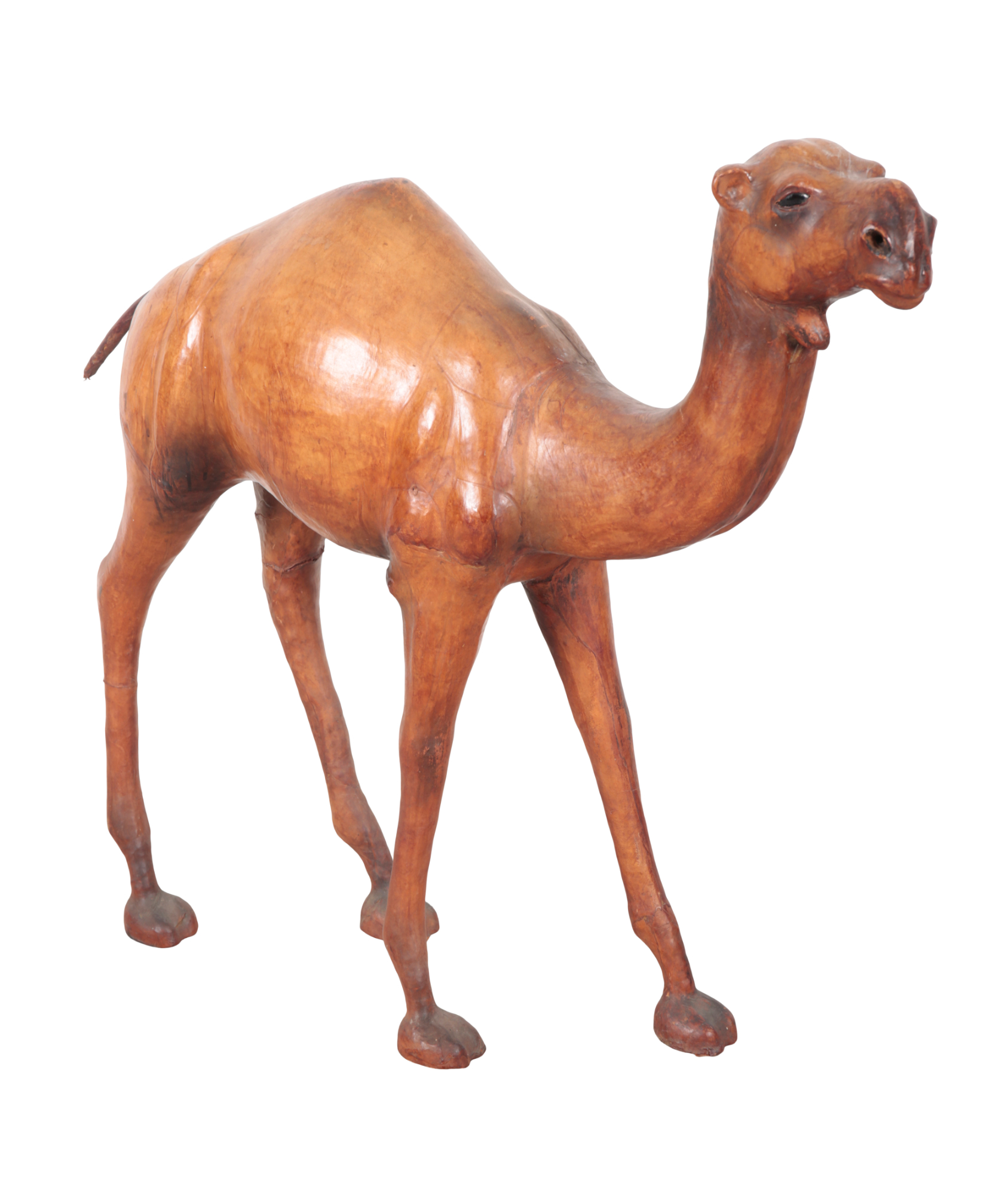 A LARGE LEATHER MODEL OF A CAMEL,
