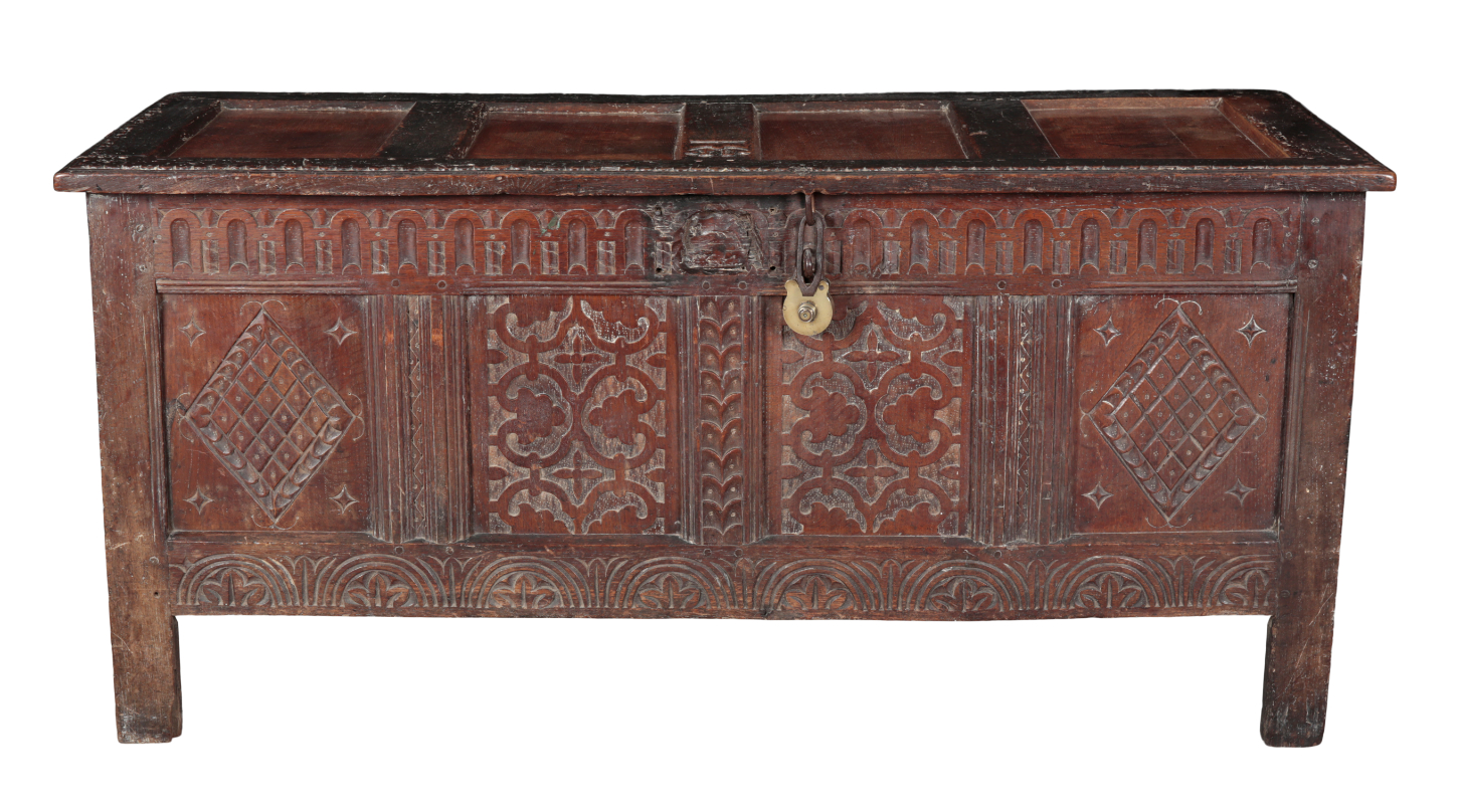 A 17TH CENTURY OAK COFFER the hinged