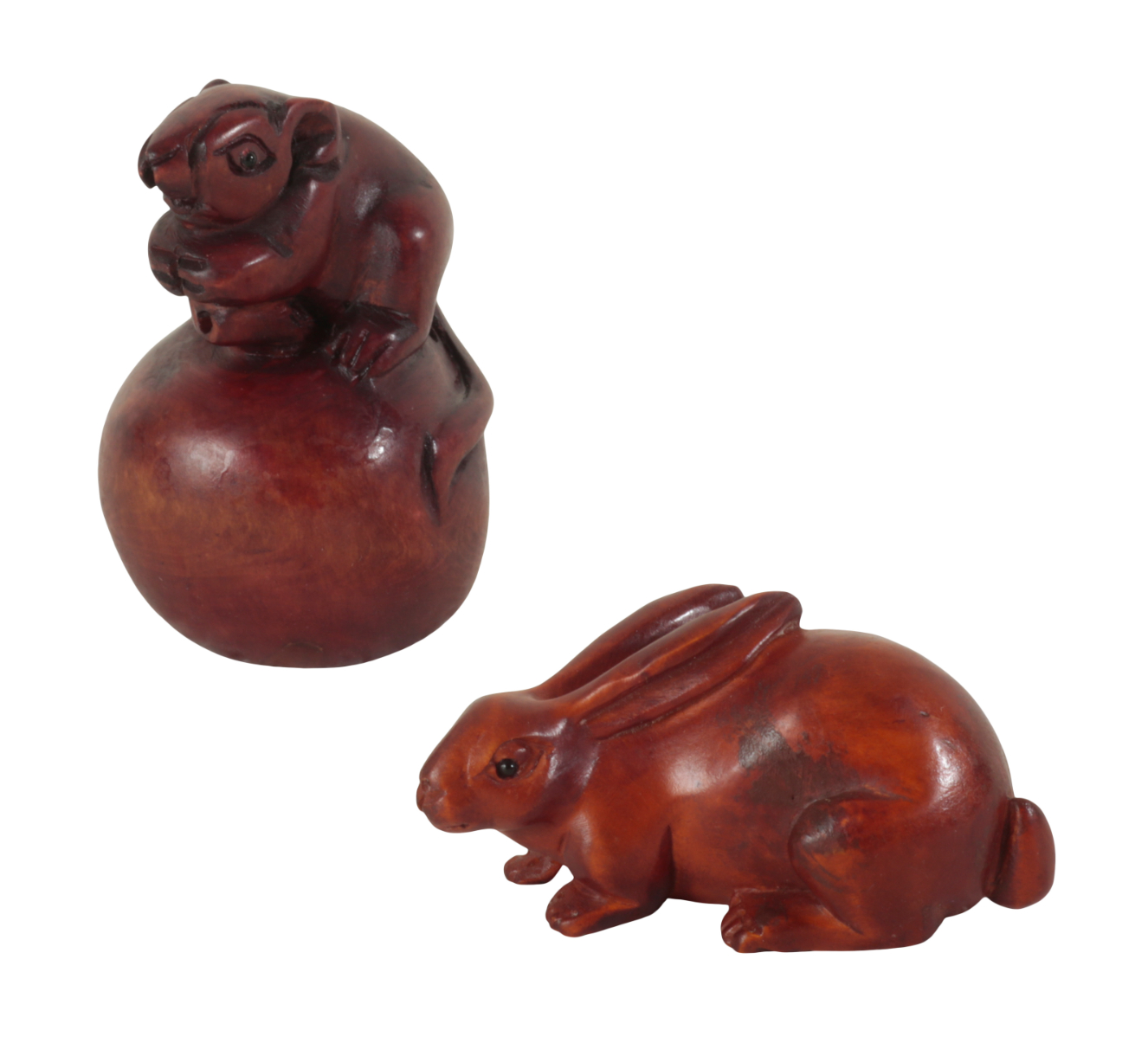 TWO JAPANESE CARVED WOOD NETSUKE