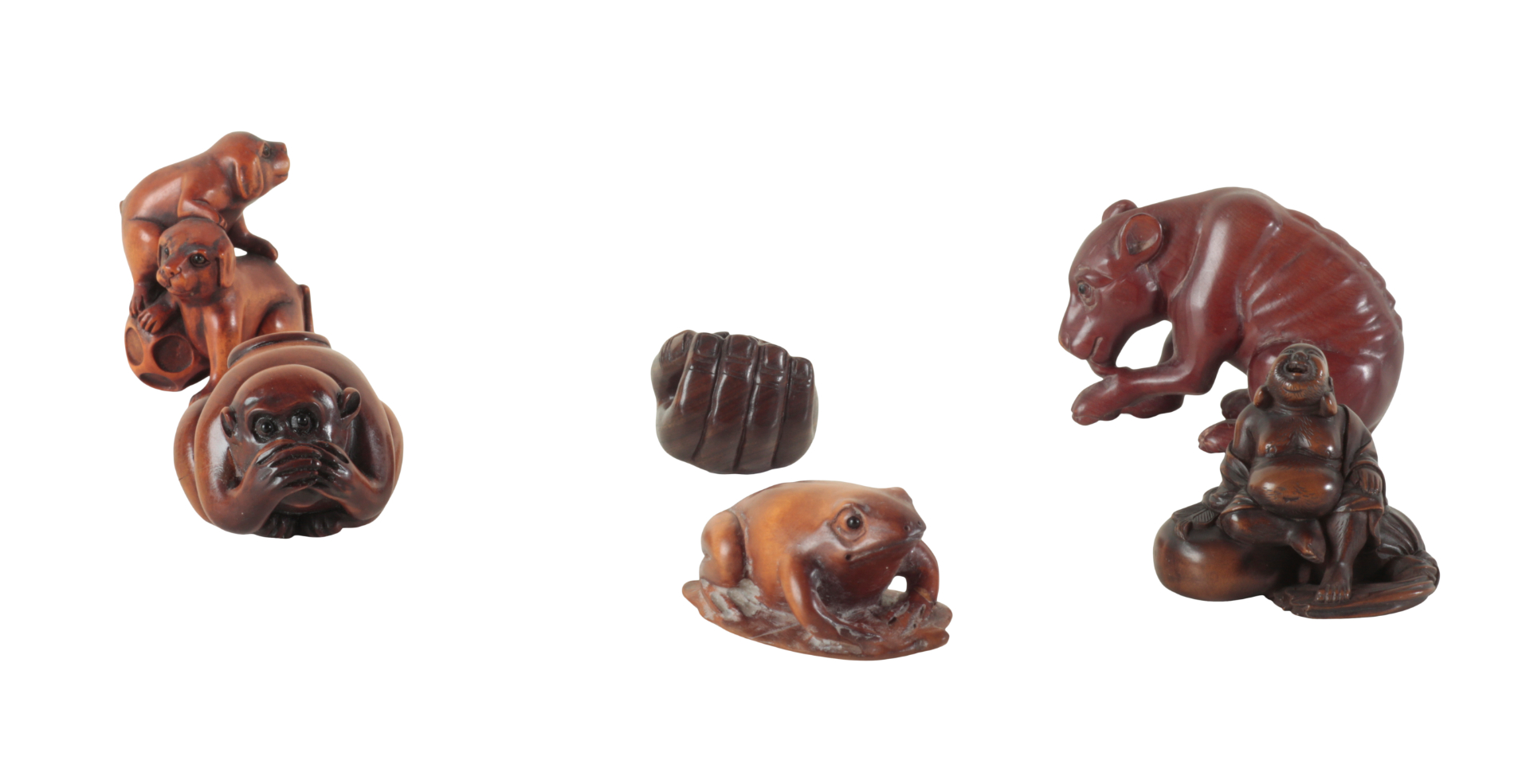 A GROUP OF SIX JAPANESE NETSUKE including