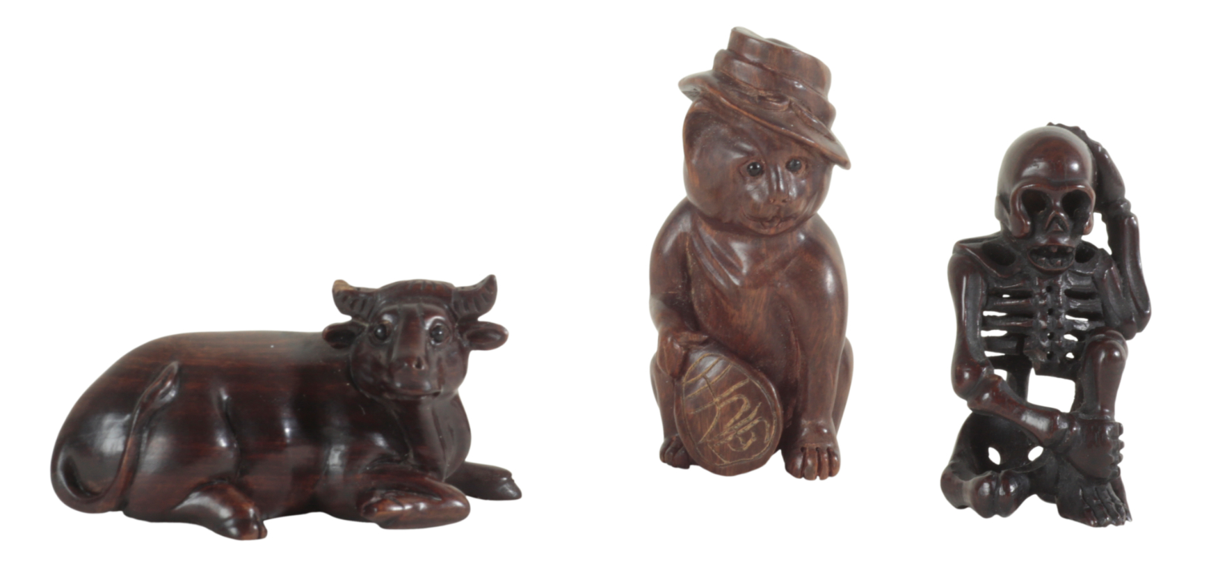 THREE JAPANESE NETSUKE including an