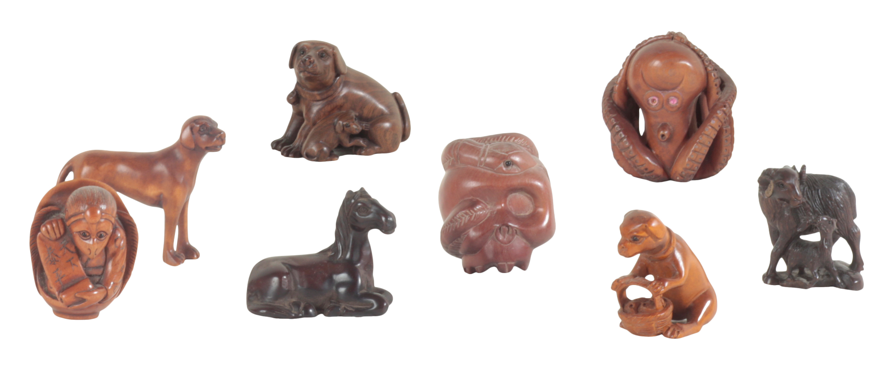 A GROUP OF EIGHT JAPANESE NETSUKE