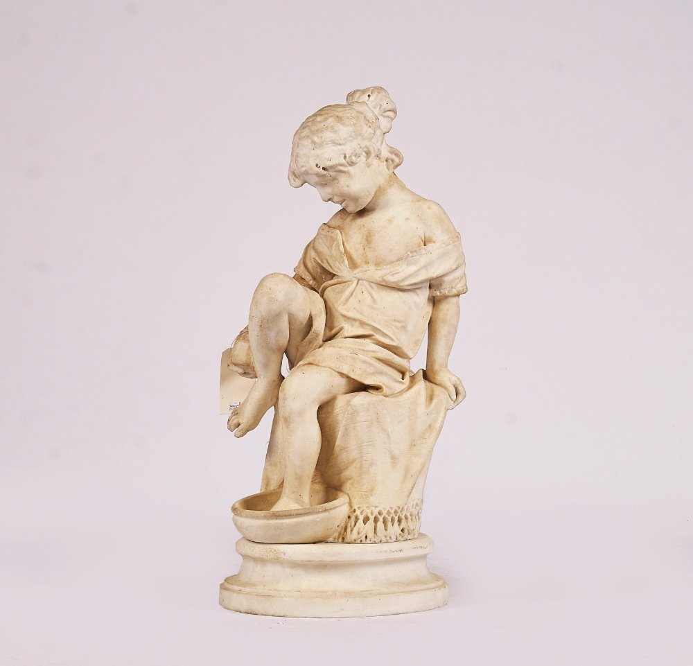 AN ITALIAN CARVED MARBLE FIGURE