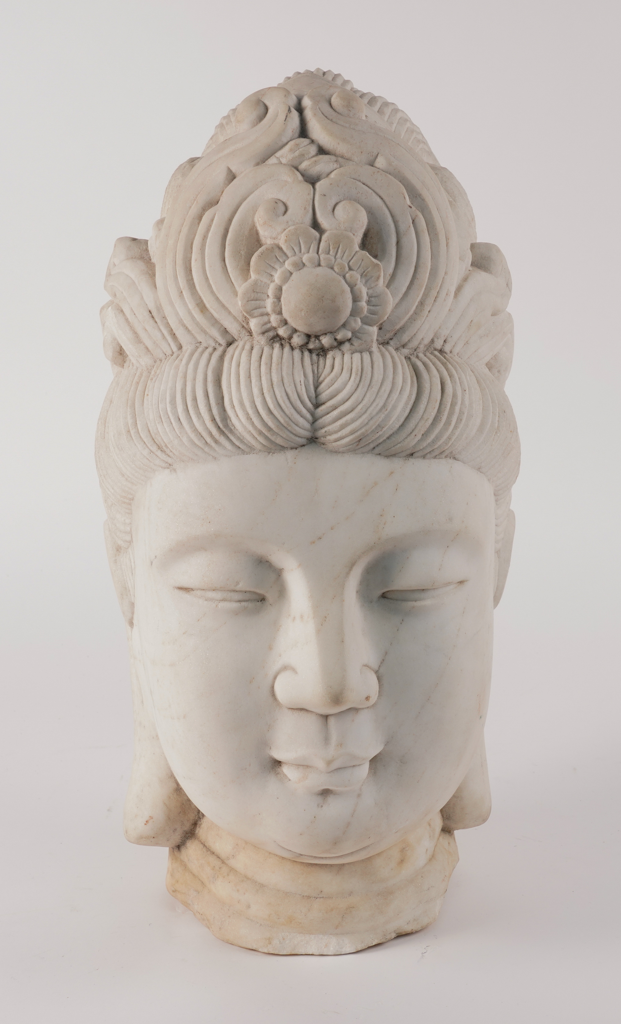 A CHINESE WHITE MARBLE HEAD OF