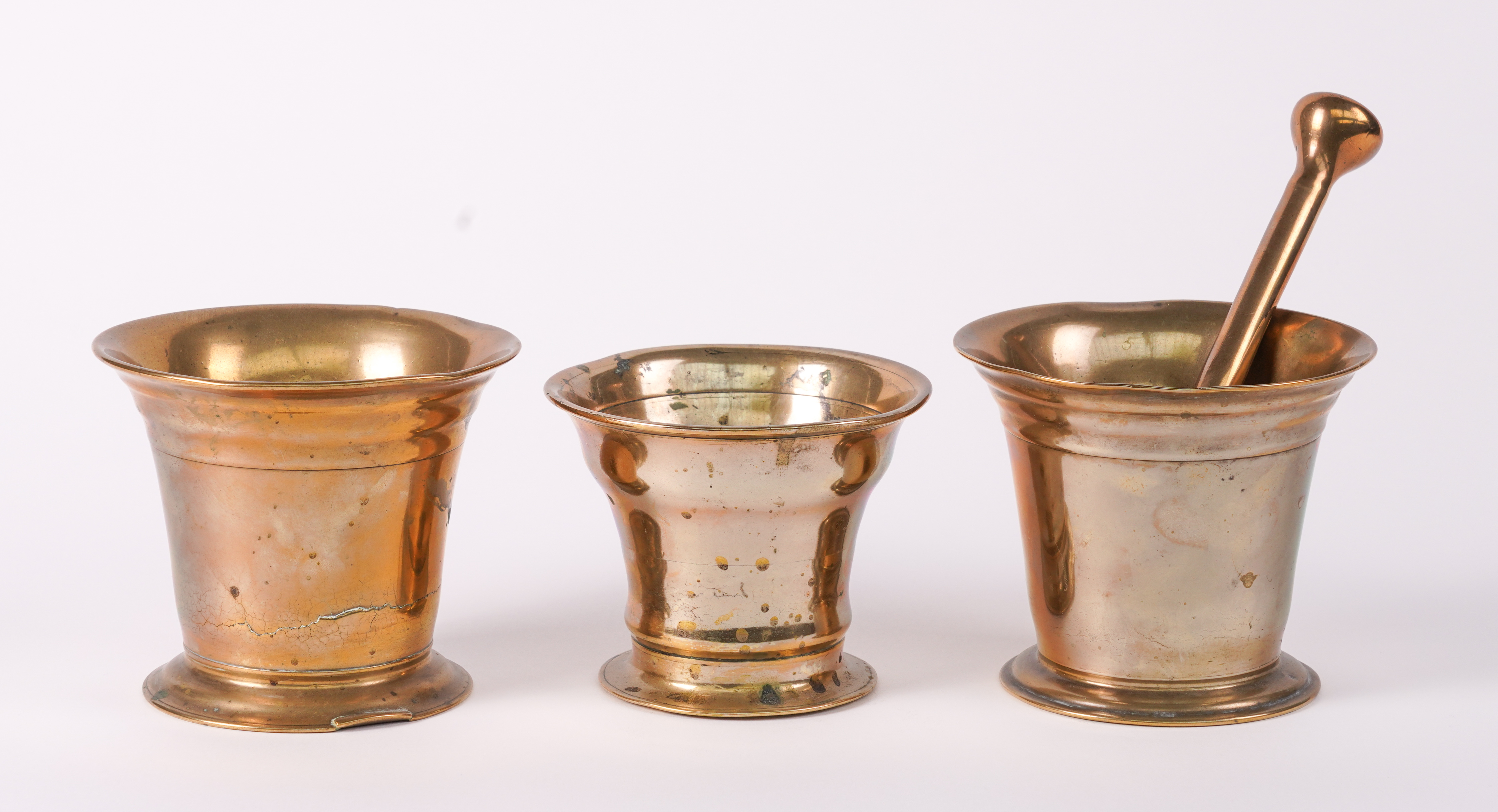 A GROUP OF THREE POLISHED BRONZE 3ae494