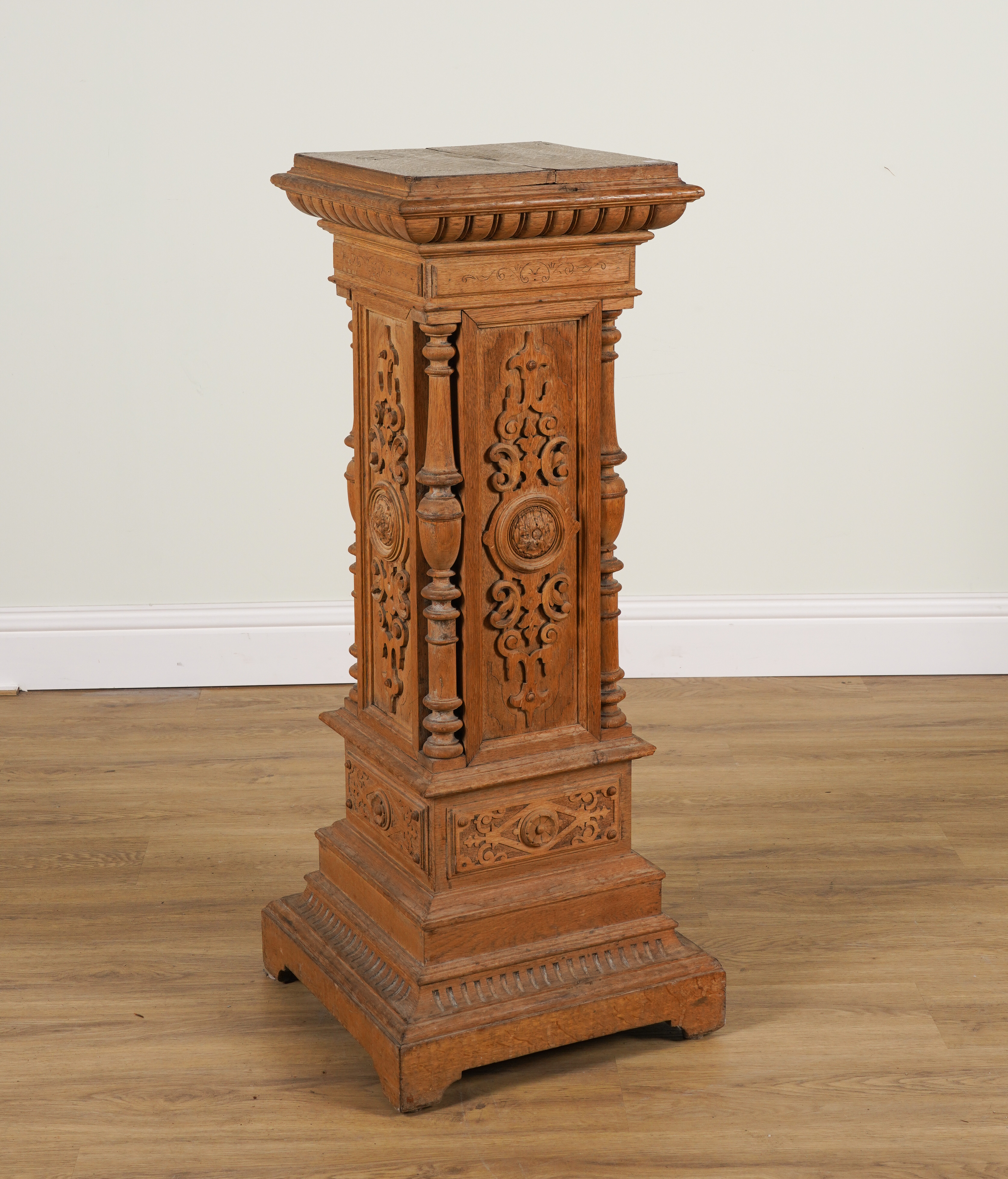 A 19TH CENTURY CARVED OAK PEDESTAL 3ae4be