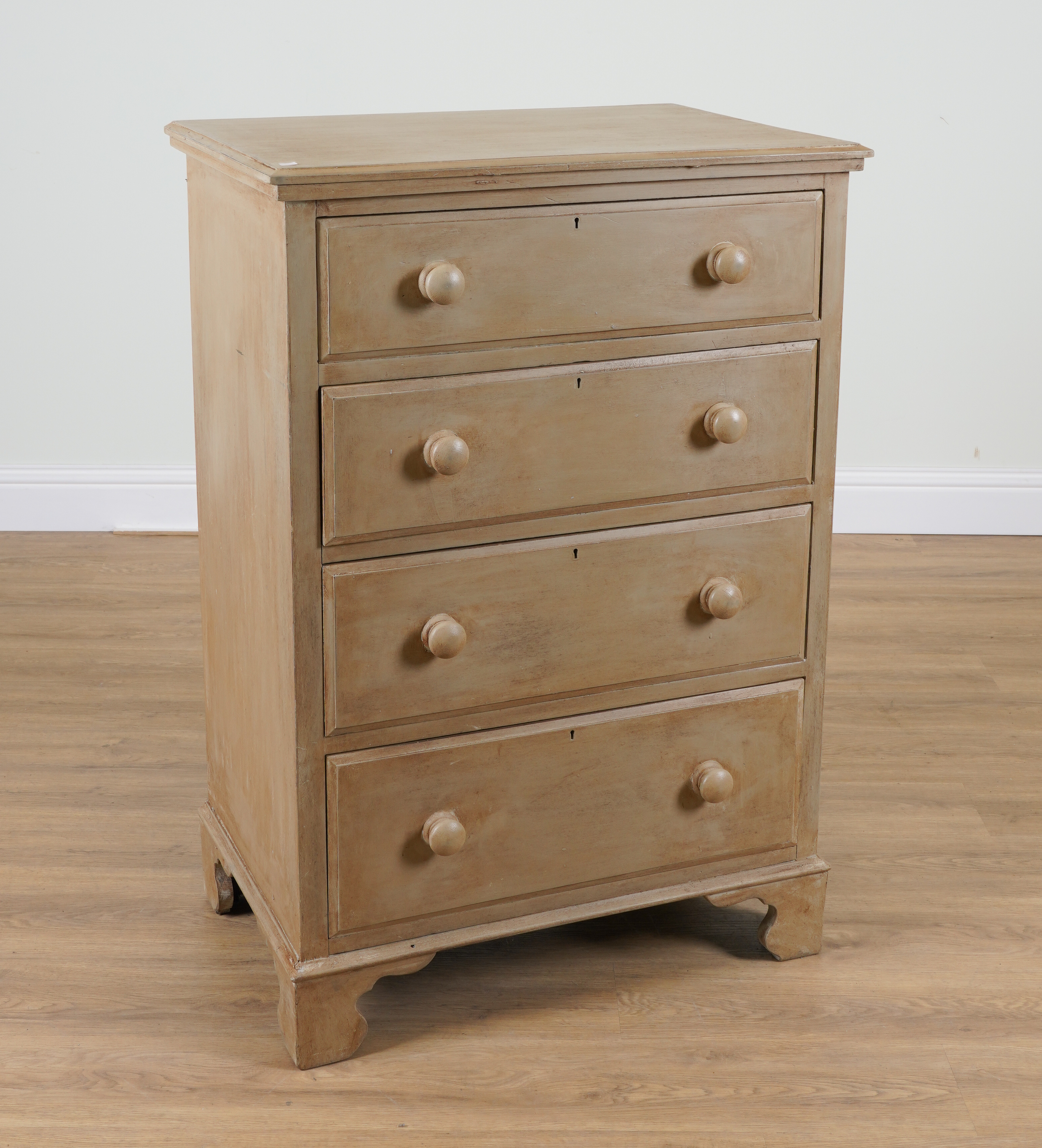 A GREEN PAINTED PINE FOUR DRAWER CHEST