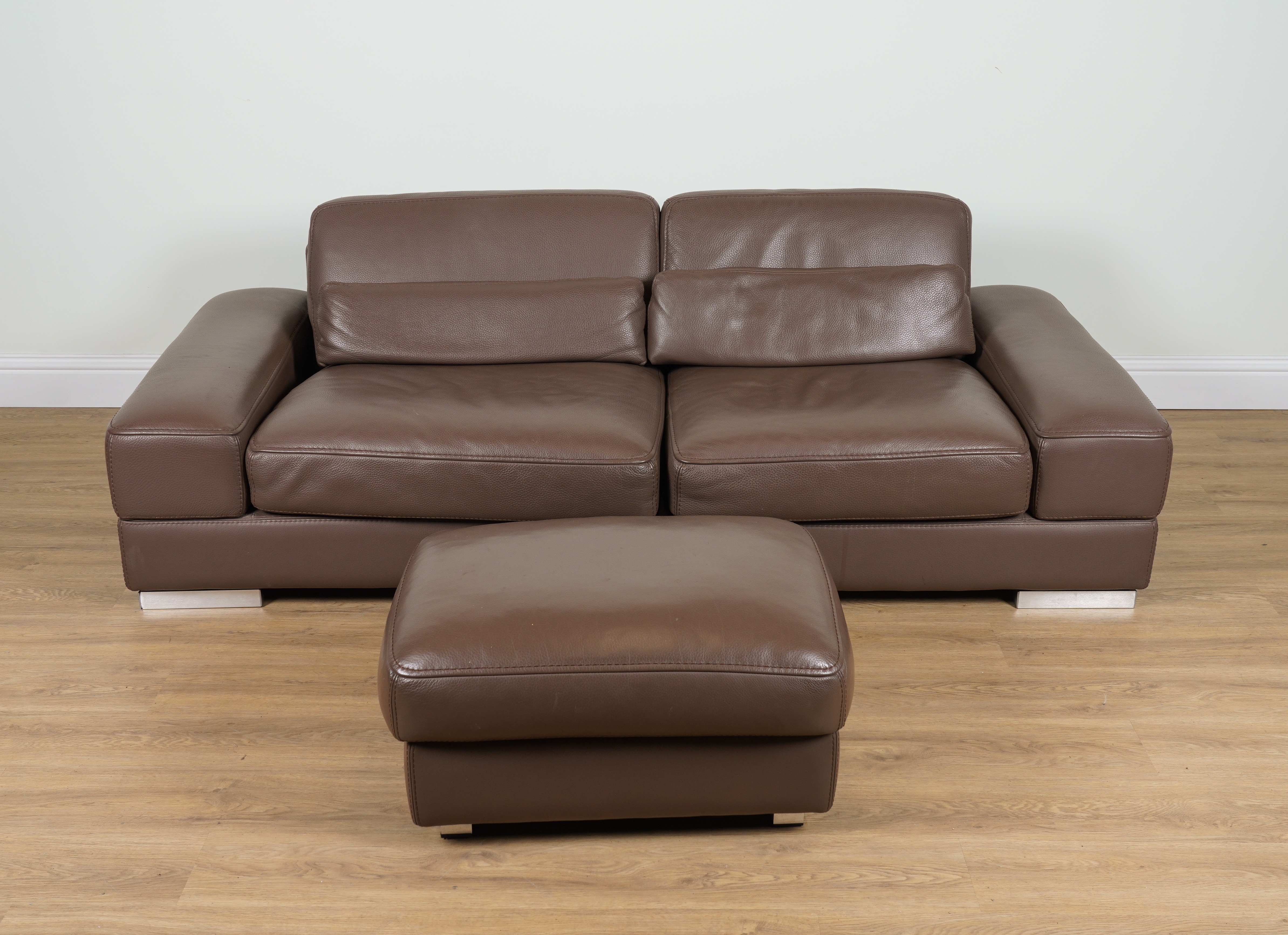 ROCHE BOBOIS; A BROWN LEATHER UPHOLSTERED