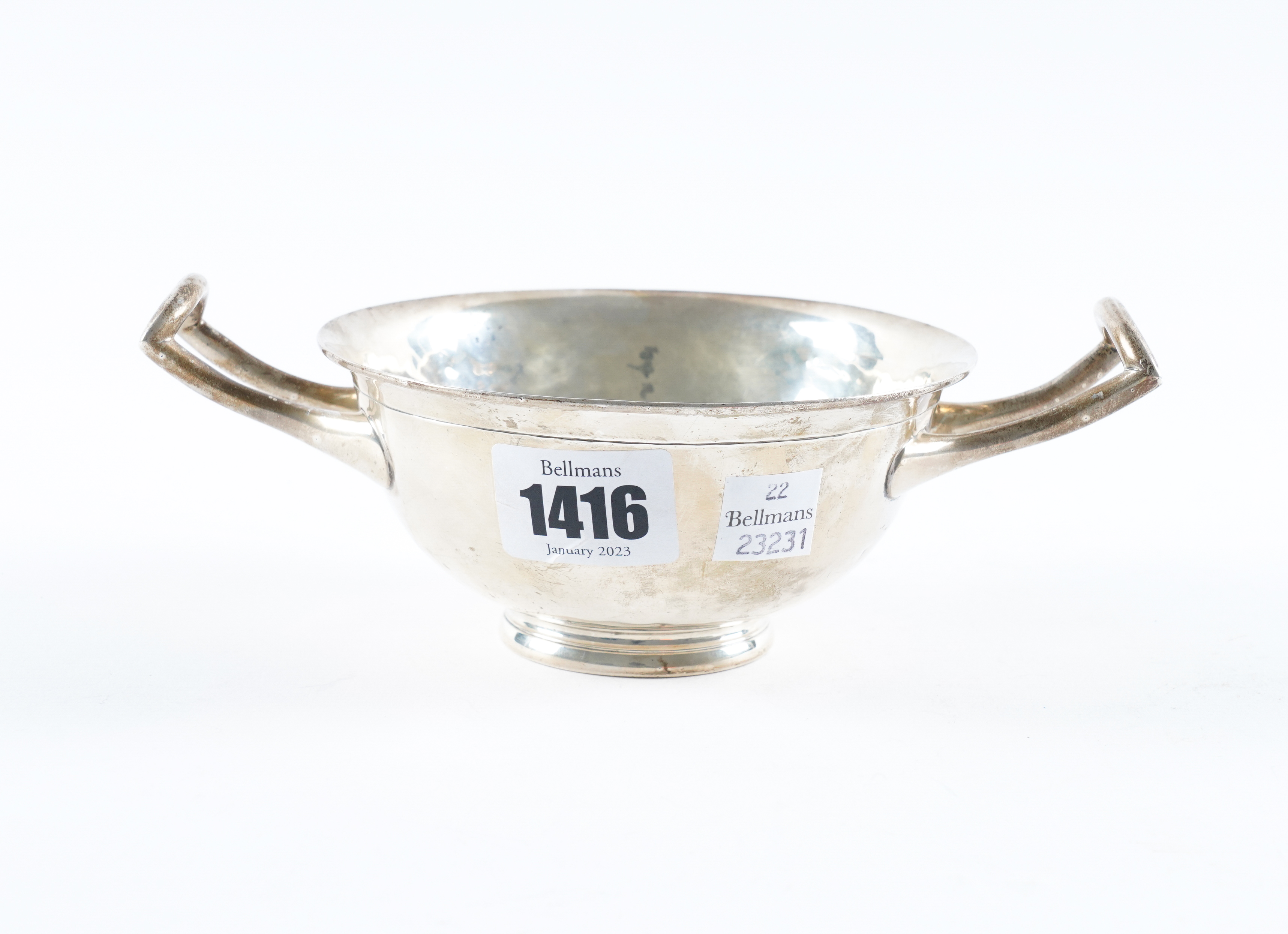 A SILVER TWIN HANDLED BOWL Of circular 3ae5ee