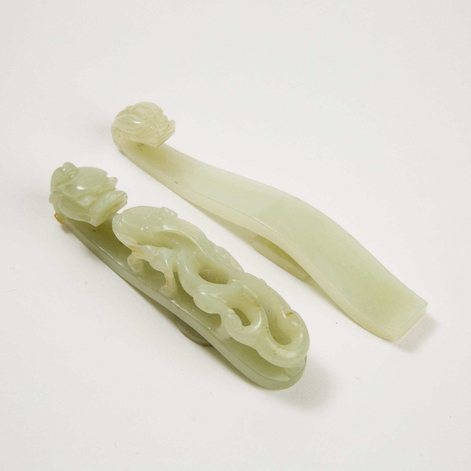 Two White Jade Belt Hooks, Qing