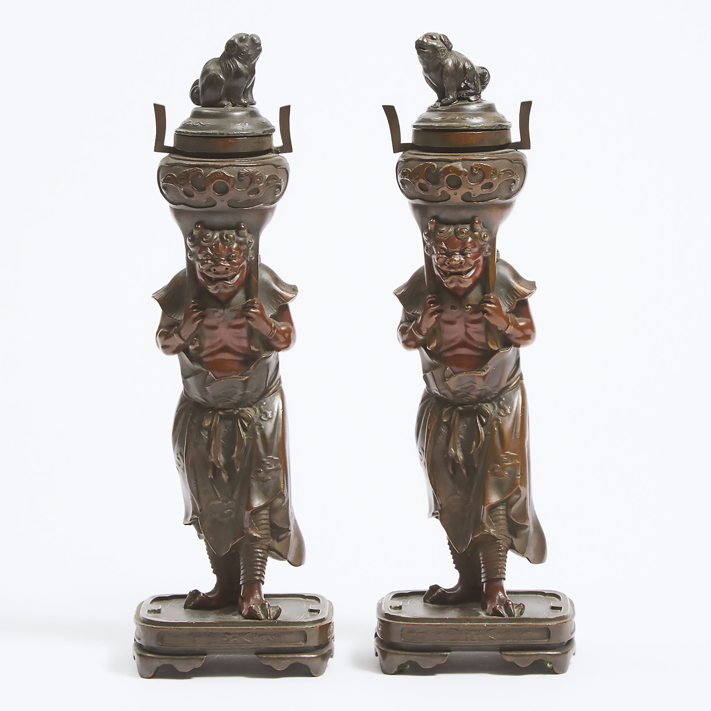 A Pair of Bronze 'Oni' Candlestick