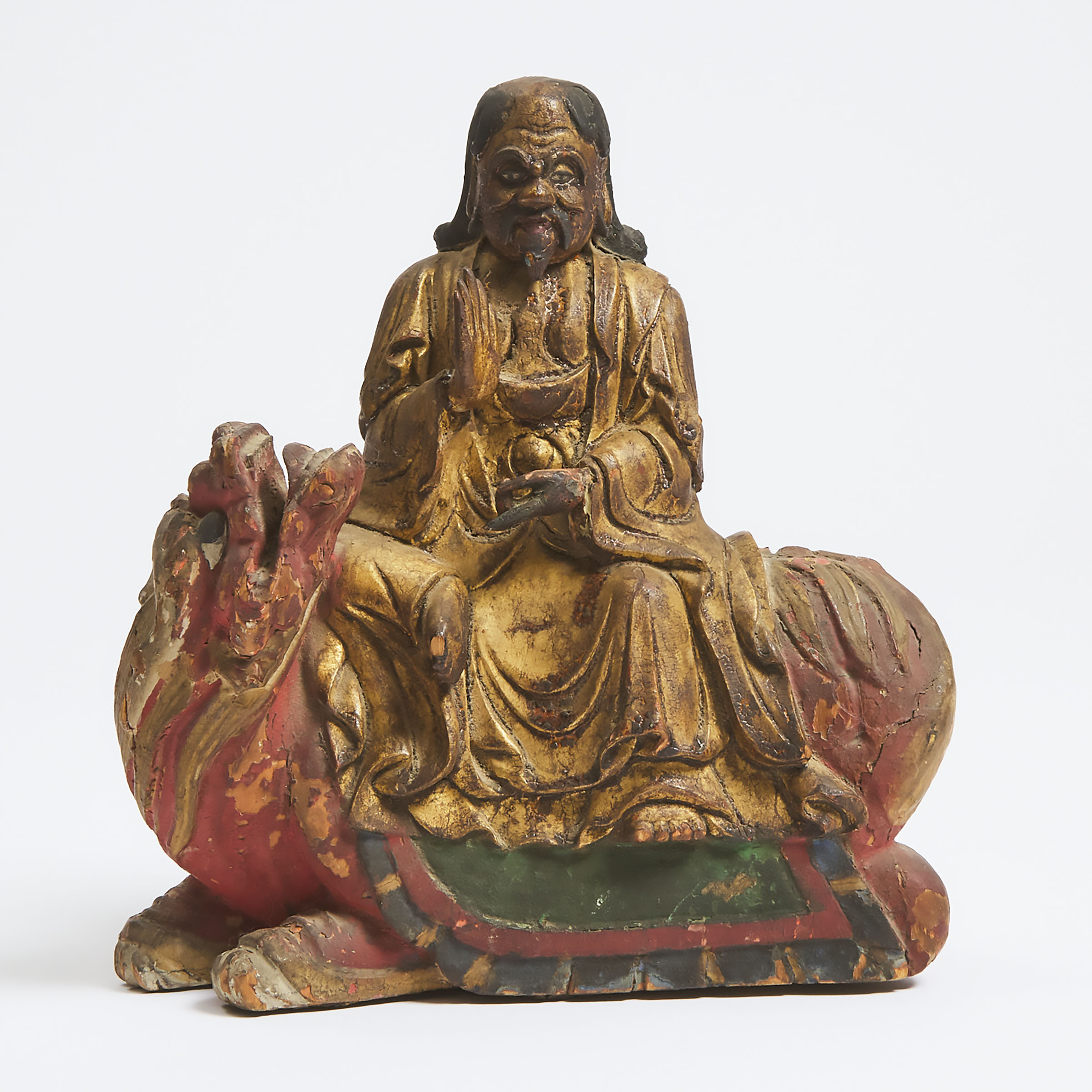 A Gilt and Polychromed Wood Figure