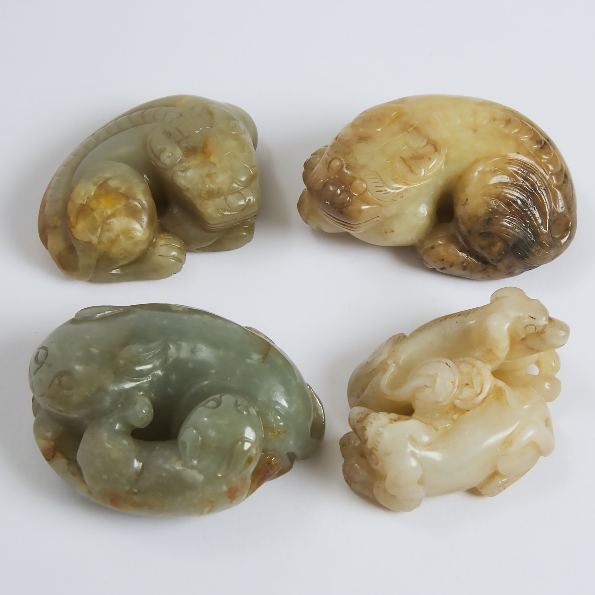 A Group of Four White and Celadon