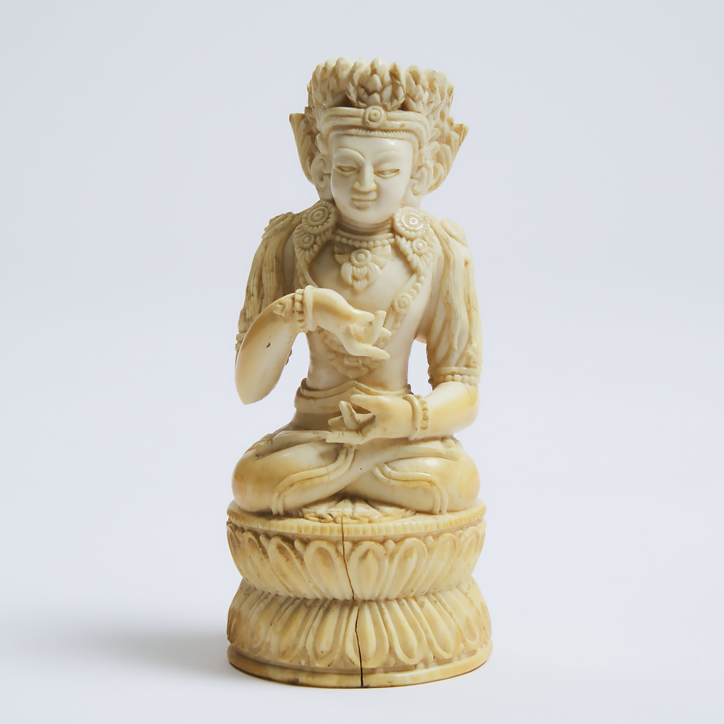 A Tibetan Ivory Figure of Buddha, 18th