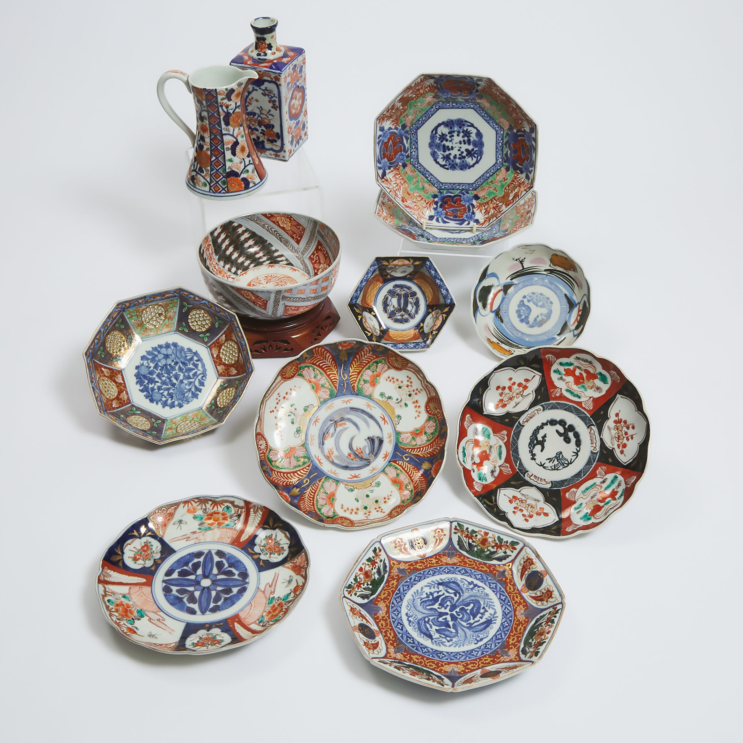 A Group of Twelve Imari Porcelain