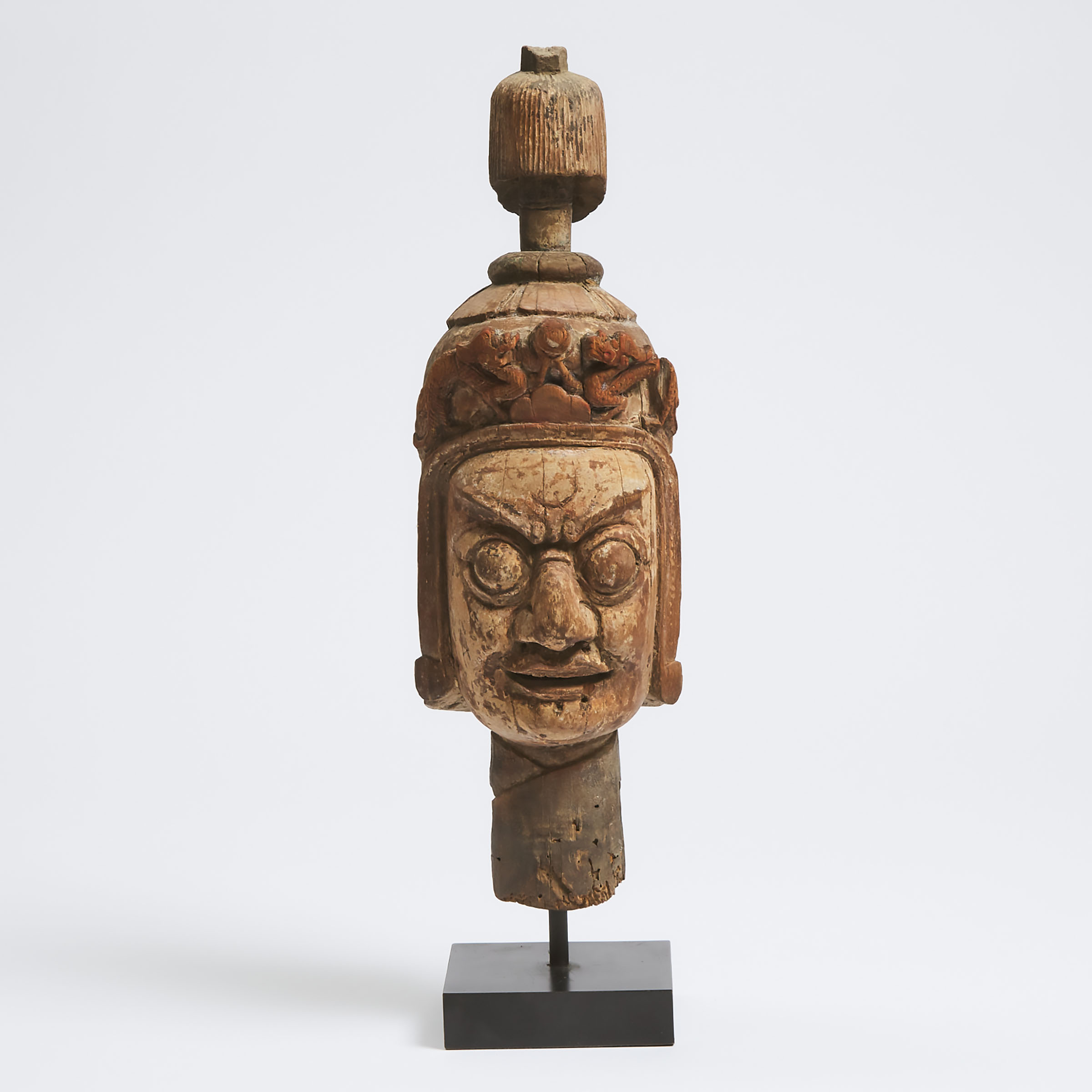 A Sino-Tibetan Carved Wood Head